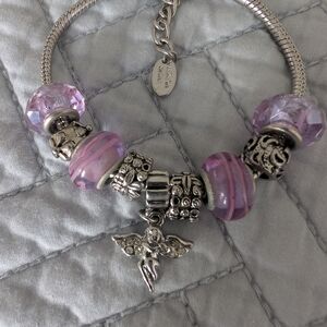 Charmed Feelings Angel Charm Braclet With Silver And Purple Accents